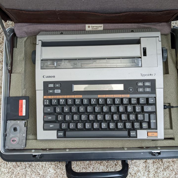 A photo of my Typestar 7 and some of its accessories in its carrying case.