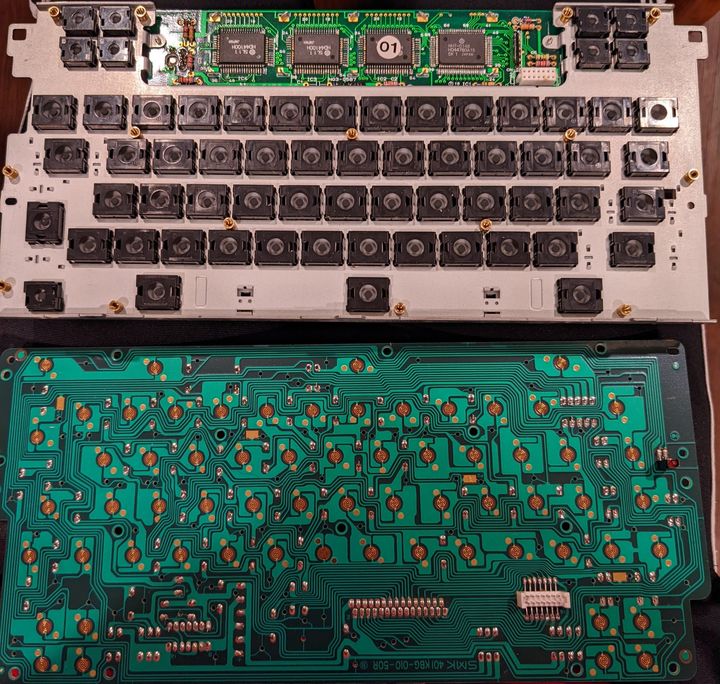 A photo of the keyboard/display assembly from the Typestar 7, disassembled to show the underside of the switches and
the contacts.