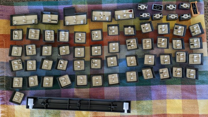 A photo of the Typestar's keycaps laid out to dry on a towel, showing their undersides.