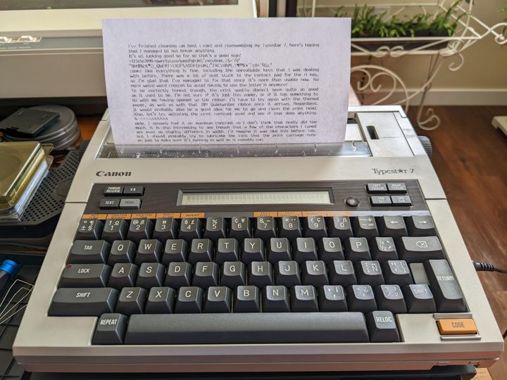 A photo of the Canon Typestar 7 typewriter with a piece of paper inserted and some text printed.